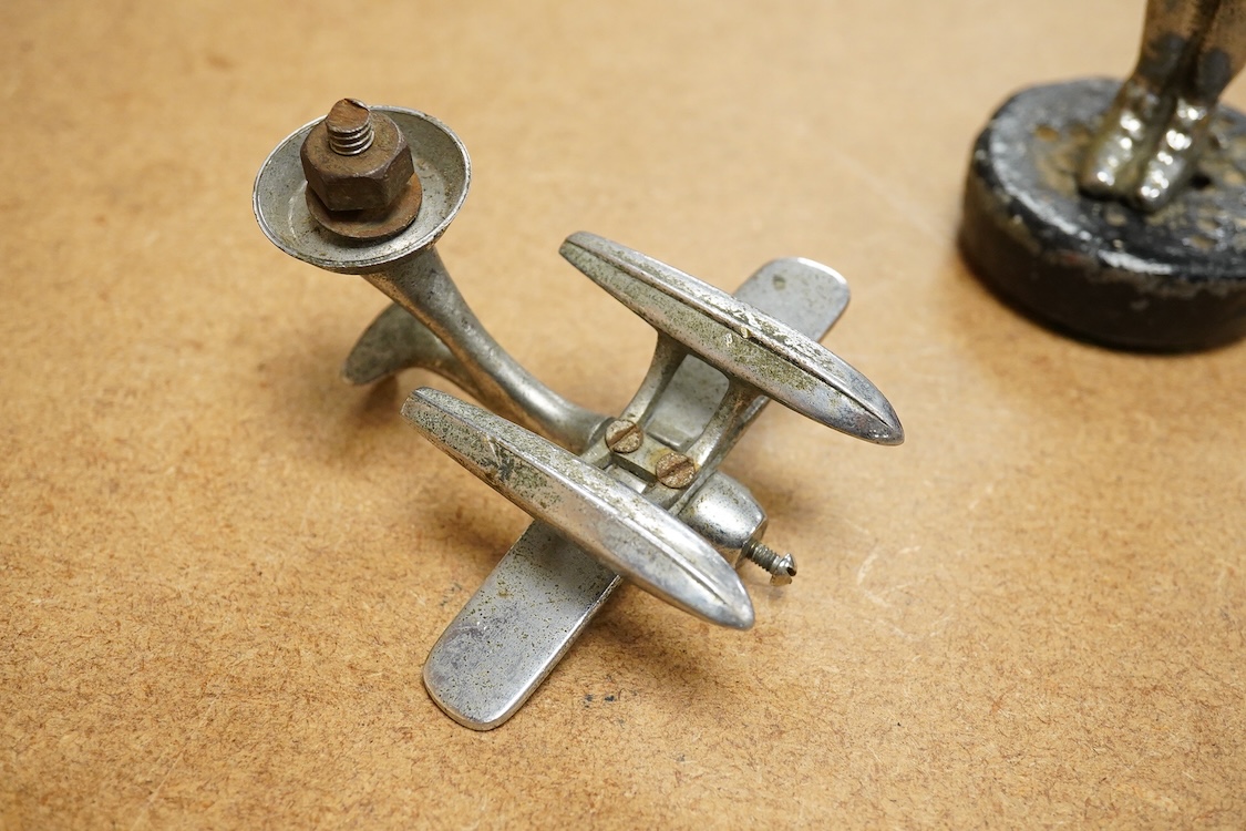 A chrome seaplane car mascot (lacking propellor) and a chrome imp car mascot- 14cm high